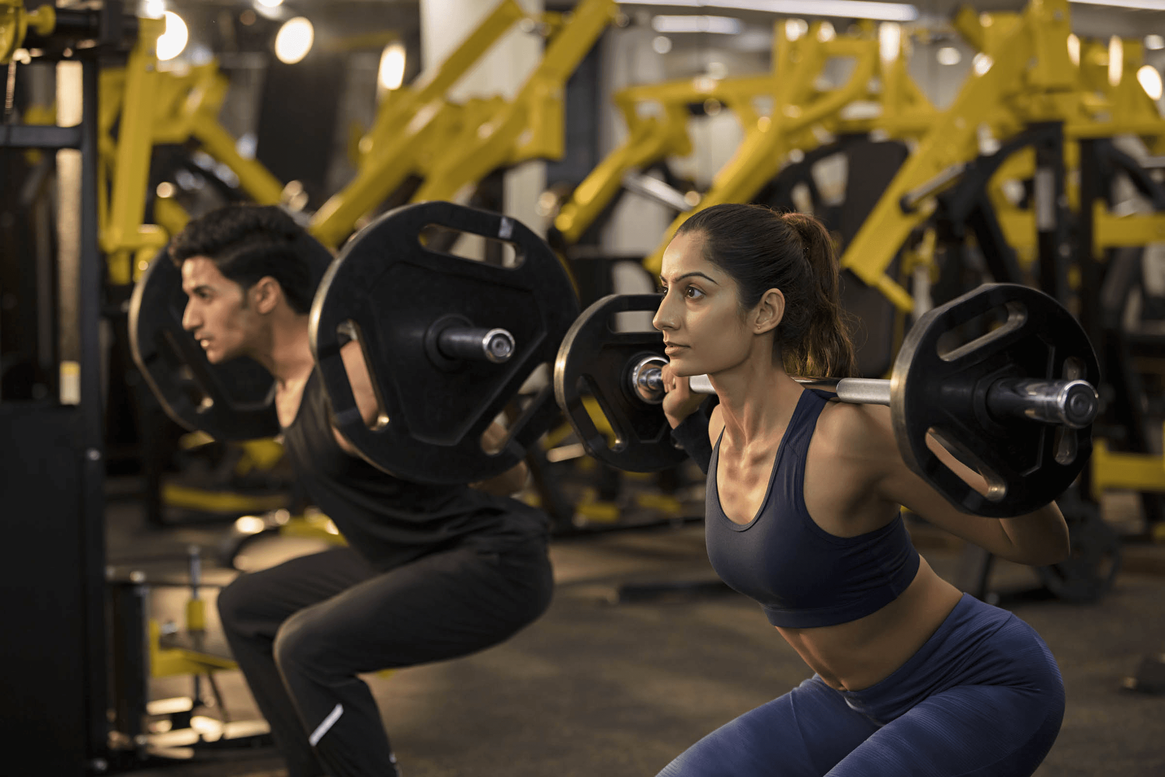 Woman lifting in a gym
