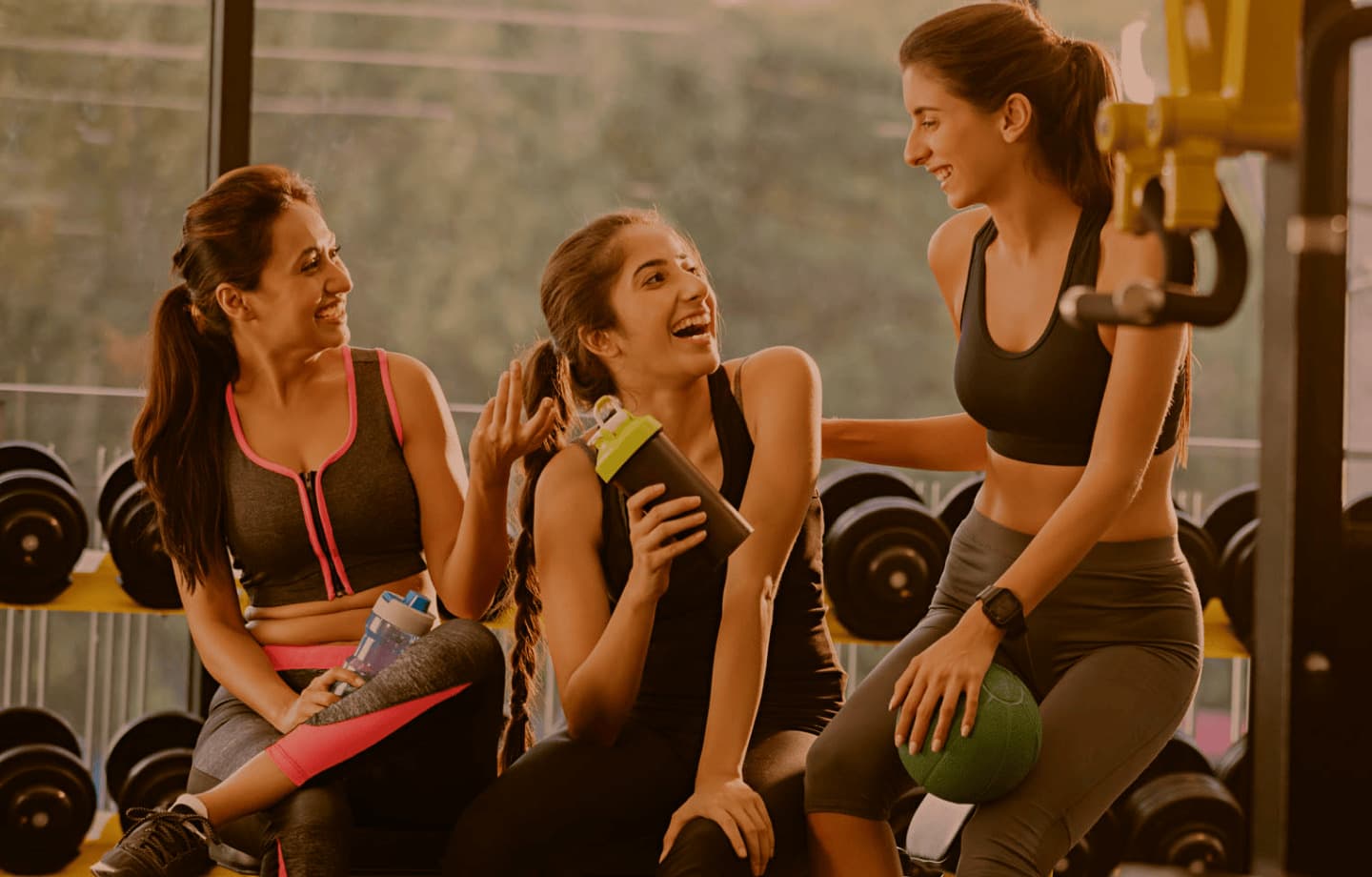 Athlete resting on battle ropes